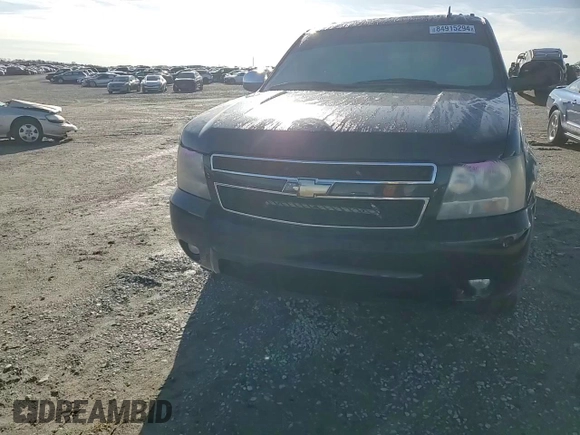2009 Chevrolet Suburban 2LT z VIN 1GNFC26069R297182, wystawiony jako Copart lot #84915294 z przebiegiem 221 946 mil mil oraz Szkoda całkowita • Salvage title. Historia ofert i sprzedaży dostępna na DreamBid. Obrazek 11.