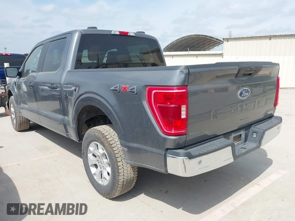 2023 Ford F-150 XL with VIN 1FTFW1E87PKF04735, listed as a IAAI auction lot 42048913 with 54,893 mi miles. Bid and sale history available at carsss.com. Image 3.