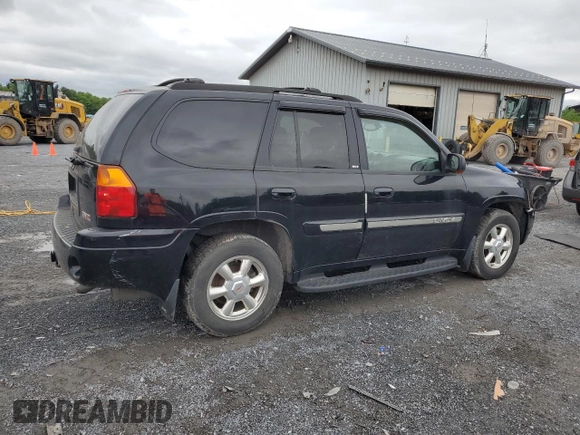 2004 GMC Envoy SLT with VIN 1GKDT13S842210243, listed as a Copart auction lot 55672595 with 148,232 mi miles and Clean Title. Bid and sale history available at DreamBid. Image 3.