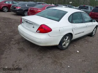 2001 Ford Taurus SES with VIN 1FAFP55U71A199807, listed as a IAAI auction lot 41761350 with 157,400 mi miles. Bid and sale history available at carsss.com. Image 4.