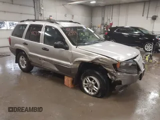 2004 Jeep Grand Cherokee Laredo with VIN 1J4GW48S44C321869, listed as a IAAI auction lot 41822099 with 181,663 mi miles. Bid and sale history available at carsss.com. Image 1.