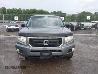 2009 Honda Ridgeline RT with VIN 5FPYK162X9B100513, listed as a IAAI auction lot 42683432 with 204,260 mi miles and . Bid and sale history available at DreamBid. Image 12.