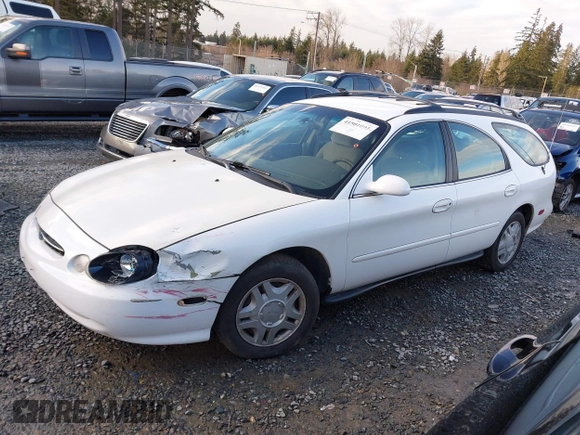 1999 Ford Taurus SE Standard with VIN 1FAFP58U5XG200924, listed as a IAAI auction lot 41501093 with 105,102 mi miles and . Bid and sale history available at DreamBid. Image 14.