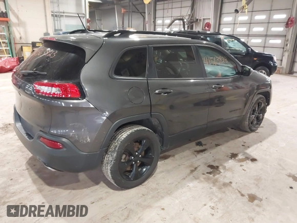 2016 Jeep Cherokee Latitude with VIN 1C4PJLCSXGW137190, listed as a IAAI auction lot 41563823 with 159,586 mi miles. Bid and sale history available at carsss.com. Image 4.