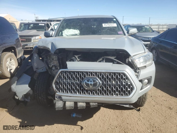 2019 Toyota Tacoma 4WD SR with VIN 5TFCZ5AN9KX197559, listed as a Copart auction lot 45792065 with 81,702 mi miles and Salvage Title. Bid and sale history available at carsss.com. Image 5.