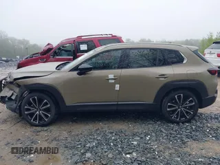 2025 Mazda CX-50 Premium z VIN 7MMVABDY2SN339010, wystawiony jako IAAI lot #42201002 z przebiegiem 36 mil mil oraz . Historia ofert i sprzedaży dostępna na DreamBid. Obrazek 14.