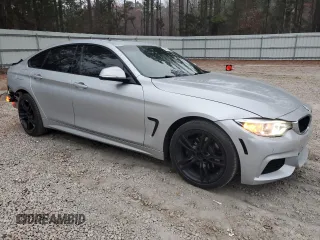 2015 BMW 4 Series 428i xDrive with VIN WBA4C9C54FG135273, listed as a Copart auction lot 48623135 with 202,238 mi miles and Salvage Title. Bid and sale history available at DreamBid. Image 4.