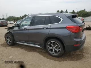 2017 BMW X1 xDrive28i with VIN WBXHT3Z3XH4A53999, listed as a Copart auction lot 60500265 with 43,377 mi miles and Salvage title. Bid and sale history available at DreamBid. Image 2.