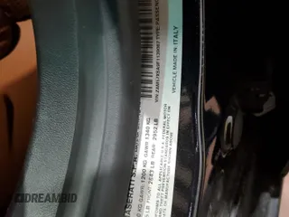 2015 Maserati Ghibli z VIN ZAM57XSA9F1139087, wystawiony jako Copart lot #52235355 z przebiegiem 68 788 mil mil oraz Szkoda całkowita • Salvage title. Historia ofert i sprzedaży dostępna na DreamBid. Obrazek 12.