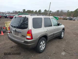 2001 Mazda Tribute LX with VIN 4F2YU08121KM45088, listed as a IAAI auction lot 41693962 with 136,121 mi miles and . Bid and sale history available at DreamBid. Image 4.