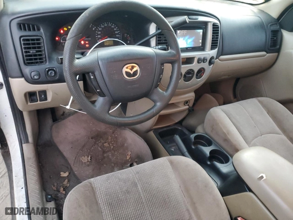 2003 Mazda Tribute LX with VIN 4F2YZ94133KM20084, listed as a Copart auction lot 82598104 with 216,848 mi miles and Salvage Title. Bid and sale history available at carsss.com. Image 8.