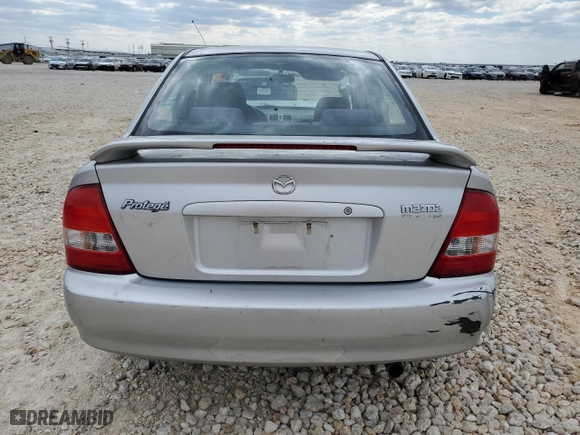 2003 Mazda Protege DX with VIN JM1BJ226631162054, listed as a Copart auction lot 70961034 with 85,794 mi miles and Salvage Title. Bid and sale history available at carsss.com. Image 6.