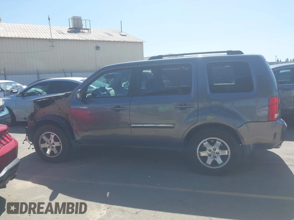 2011 Honda Pilot Touring with VIN 5FNYF4H96BB083532, listed as a IAAI auction lot 41926177 with 100,815 mi miles. Bid and sale history available at carsss.com. Image 15.