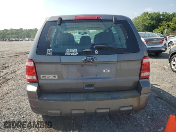 2012 Ford Escape XLS with VIN 1FMCU0C78CKA70652, listed as a Copart auction lot 60624215 with 203,220 mi miles and Clean title. Bid and sale history available at DreamBid. Image 6.