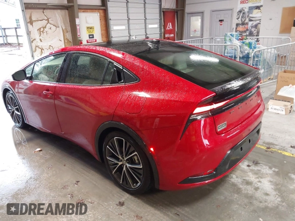 2024 Toyota Prius LE with VIN JTDACAAUXR3039886, listed as a IAAI auction lot 41928633 with 1,468 mi miles and . Bid and sale history available at DreamBid. Image 3.