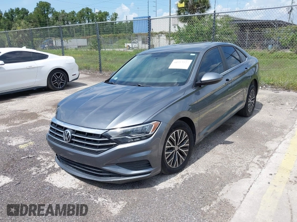 2021 Volkswagen Jetta S z VIN 3VWC57BU4MM009727, wystawiony jako IAAI lot #42339309 z przebiegiem 52 395 mil mil oraz . Historia ofert i sprzedaży dostępna na DreamBid. Obrazek 2.