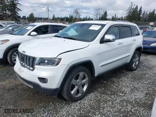 2013 Jeep Grand Cherokee Limited with VIN 1C4RJFBT0DC619216, listed as a IAAI auction lot 41703137 with 142,577 mi miles. Bid and sale history available at carsss.com. Image 2.