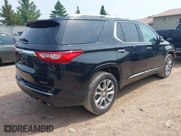 2019 Chevrolet Traverse Premier with VIN 1GNEVKKW1KJ282531, listed as a IAAI auction lot 42408361 with 95,464 mi miles and . Bid and sale history available at DreamBid. Image 4.