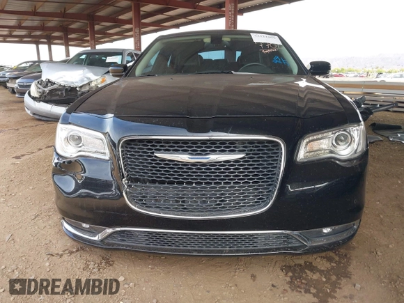 2016 Chrysler 300 Anniversary Edition with VIN 2C3CCAAG4GH141217, listed as a IAAI auction lot 42121809 with 74,739 mi miles and . Bid and sale history available at DreamBid. Image 13.
