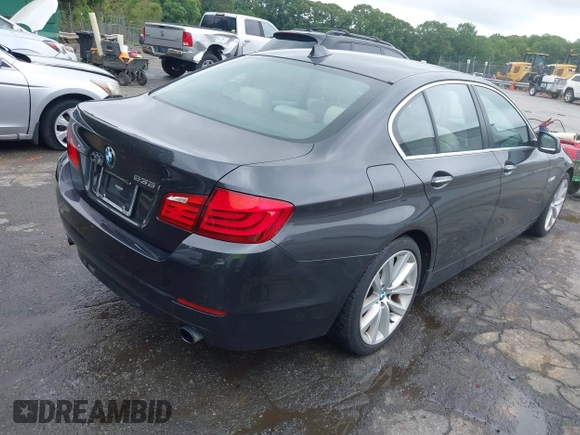 2013 BMW 5 Series 535i xDrive with VIN WBAFU7C51DDU71410, listed as a IAAI auction lot 42332603 with 84,261 mi miles and . Bid and sale history available at DreamBid. Image 4.