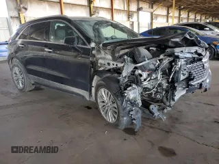 2024 Cadillac XT4 AWD Premium Luxury with VIN 1GYFZDR47RF153590, listed as a Copart auction lot 42846045 with 2,261 mi miles and Salvage title. Bid and sale history available at DreamBid. Image 4.