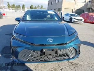 2025 Toyota Camry LE with VIN 4T1DAACK8SU051433, listed as a IAAI auction lot 41893289 with 10,084 mi miles and . Bid and sale history available at DreamBid. Image 12.