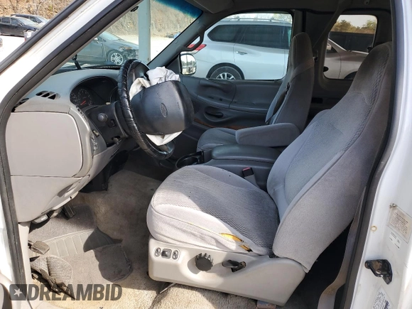 1997 Ford F-150 z VIN 1FTDX0766VKA86983, wystawiony jako Copart lot #50896215 z przebiegiem 214 746 mil mil oraz Szkoda całkowita • Salvage title. Historia ofert i sprzedaży dostępna na DreamBid. Obrazek 7.