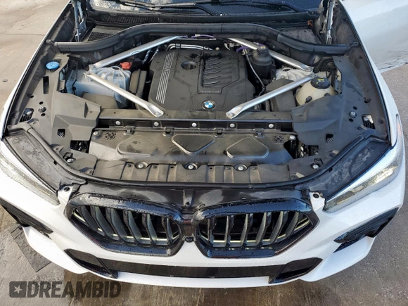 2023 BMW X6 xDrive40i z VIN 5UXCY6C08P9N43749, wystawiony jako Copart lot #54092795 z przebiegiem 39 495 mil mil oraz Szkody całkowita. Historia ofert i sprzedaży dostępna na DreamBid. Obrazek 12.