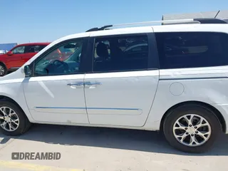 2014 Kia Sedona EX with VIN KNDMH4C76E6554982, listed as a IAAI auction lot 41980362 with 164,380 mi miles and . Bid and sale history available at DreamBid. Image 14.