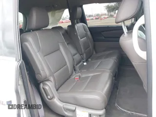 2013 Honda Odyssey Touring with VIN 5FNRL5H99DB041328, listed as a IAAI auction lot 41797520 with 148,523 mi miles and . Bid and sale history available at carsss.com. Image 8.