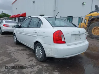 2009 Hyundai Accent Auto GLS with VIN KMHCN46C19U351198, listed as a IAAI auction lot 41896018 with 205,594 mi miles. Bid and sale history available at carsss.com. Image 3.