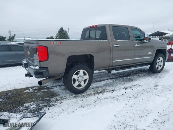 2015 Chevrolet Silverado 2500HD Built After Aug 14 High Country with VIN 1GC1KXE89FF543780, listed as a IAAI auction lot 41557608 with 164,171 mi miles. Bid and sale history available at carsss.com. Image 4.