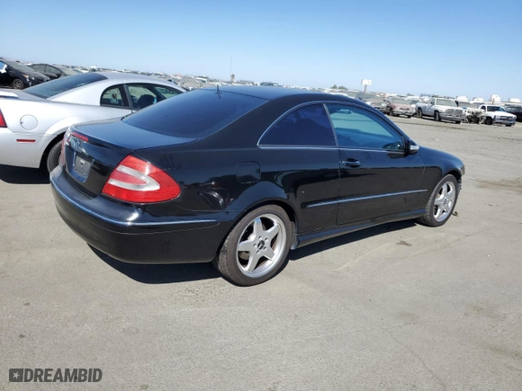 2003 Mercedes-Benz CLK-Class 5.0L with VIN WDBTJ75J43F018571, listed as a Copart auction lot 72736304 with 125,780 mi miles and Salvage Title. Bid and sale history available at carsss.com. Image 3.