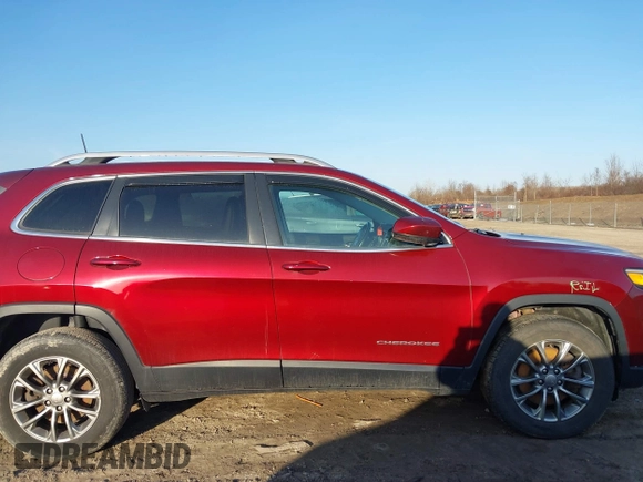 2019 Jeep Cherokee Latitude Plus with VIN 1C4PJMLB9KD410730, listed as a IAAI auction lot 41762344 with 82,097 mi miles and . Bid and sale history available at carsss.com. Image 13.