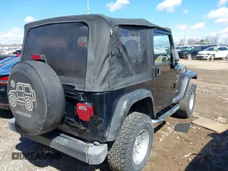 2000 Jeep Wrangler Sport with VIN 1J4FA49S8YP749547, listed as a IAAI auction lot 41861030 with 110,186 mi miles and . Bid and sale history available at DreamBid. Image 4.