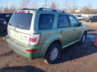 2010 Mercury Mariner Premier with VIN 4M2CN9H76AKJ09759, listed as a IAAI auction lot 41766694 with 119,546 mi miles. Bid and sale history available at carsss.com. Image 4.