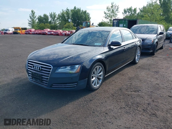2011 Audi A8 with VIN WAURVAFD4BN018884, listed as a IAAI auction lot 42693000 with 116,952 mi miles and . Bid and sale history available at DreamBid. Image 2.