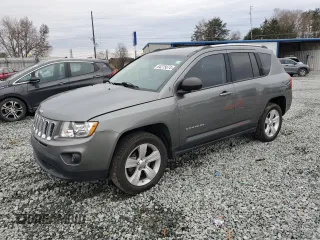 2012 Jeep Compass Latitude with VIN 1C4NJCEA1CD677125, listed as a Copart auction lot 84275674 with 161,487 mi miles and Salvage Title. Bid and sale history available at carsss.com. Image 1.