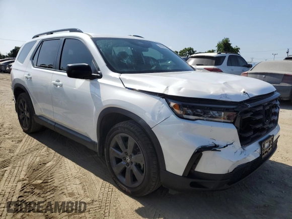 2023 Honda Pilot Sport with VIN 5FNYG2H30PB012041, listed as a Copart auction lot 62038135 with 30,558 mi miles and Salvage title. Bid and sale history available at DreamBid. Image 4.