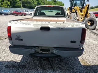 2000 Ford F-150 XL с VIN 1FTRX17L5YKB07702, выставлен на аукционе Copart как лот 62188465 с пробегом Не указан миль и Чистый • Clean title. История ставок и продаж доступна на DreamBid. Изображение 6.