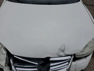 2009 Volkswagen Jetta S with VIN 3VWJM71K69M035974, listed as a Copart auction lot 56979765 with Not provided miles and Salvage title. Bid and sale history available at DreamBid. Image 11.