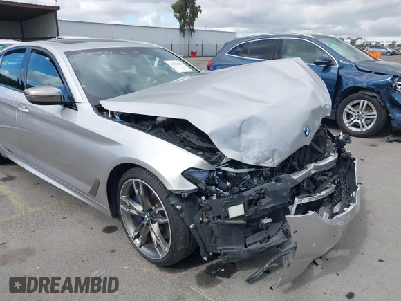 2020 BMW 5 Series M550i xDrive z VIN WBAJS7C07LCD85532, wystawiony jako IAAI lot #41518071 z przebiegiem 57 645 mil mil oraz . Historia ofert i sprzedaży dostępna na DreamBid. Obrazek 18.