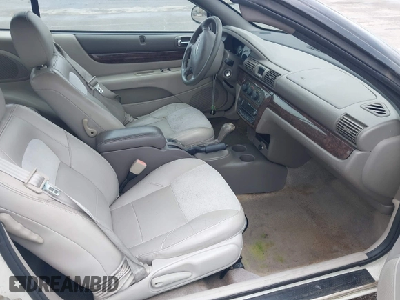 2005 Chrysler Sebring Limited z VIN 1C3EL65R15N502070, wystawiony jako IAAI lot #42407558 z przebiegiem 145 448 mil mil oraz . Historia ofert i sprzedaży dostępna na DreamBid. Obrazek 5.