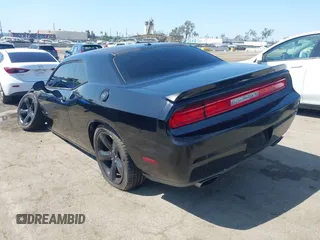 2014 Dodge Challenger R/T with VIN 2C3CDYBT8EH280622, listed as a IAAI auction lot 41973994 with 86,983 mi miles and . Bid and sale history available at DreamBid. Image 3.