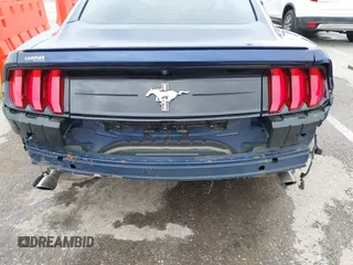 2020 Ford Mustang EcoBoost with VIN 1FA6P8TH2L5108722, listed as a IAAI auction lot 42182257 with 65,651 mi miles and . Bid and sale history available at DreamBid. Image 6.