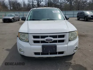 2010 Ford Escape Hybrid z VIN 1FMCU5K30AKC13098, wystawiony jako Copart lot #53623855 z przebiegiem 206 975 mil mil oraz Szkoda całkowita • Salvage title. Historia ofert i sprzedaży dostępna na DreamBid. Obrazek 5.