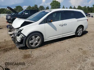 2011 Honda Odyssey Touring with VIN 5FNRL5H96BB084473, listed as a Copart auction lot 61681075 with 227,455 mi miles and Salvage title. Bid and sale history available at DreamBid. Image 1.
