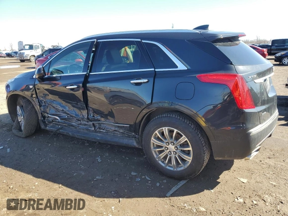 2019 Cadillac XT5 Luxury AWD with VIN 1GYKNDRS7KZ267795, listed as a Copart auction lot 49582025 with 134,241 mi miles and Clean title. Bid and sale history available at DreamBid. Image 2.