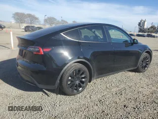 2021 Tesla Model Y Long Range z VIN 5YJYGDEE3MF092495, wystawiony jako Copart lot #50664225 z przebiegiem 72 947 mil mil oraz Szkoda całkowita • Salvage title. Historia ofert i sprzedaży dostępna na DreamBid. Obrazek 3.