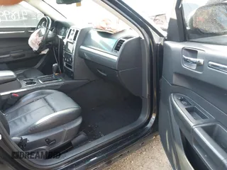 2010 Chrysler 300 Touring with VIN 2C3CA5CV2AH134024, listed as a IAAI auction lot 41899901 with 164,797 mi miles. Bid and sale history available at carsss.com. Image 5.